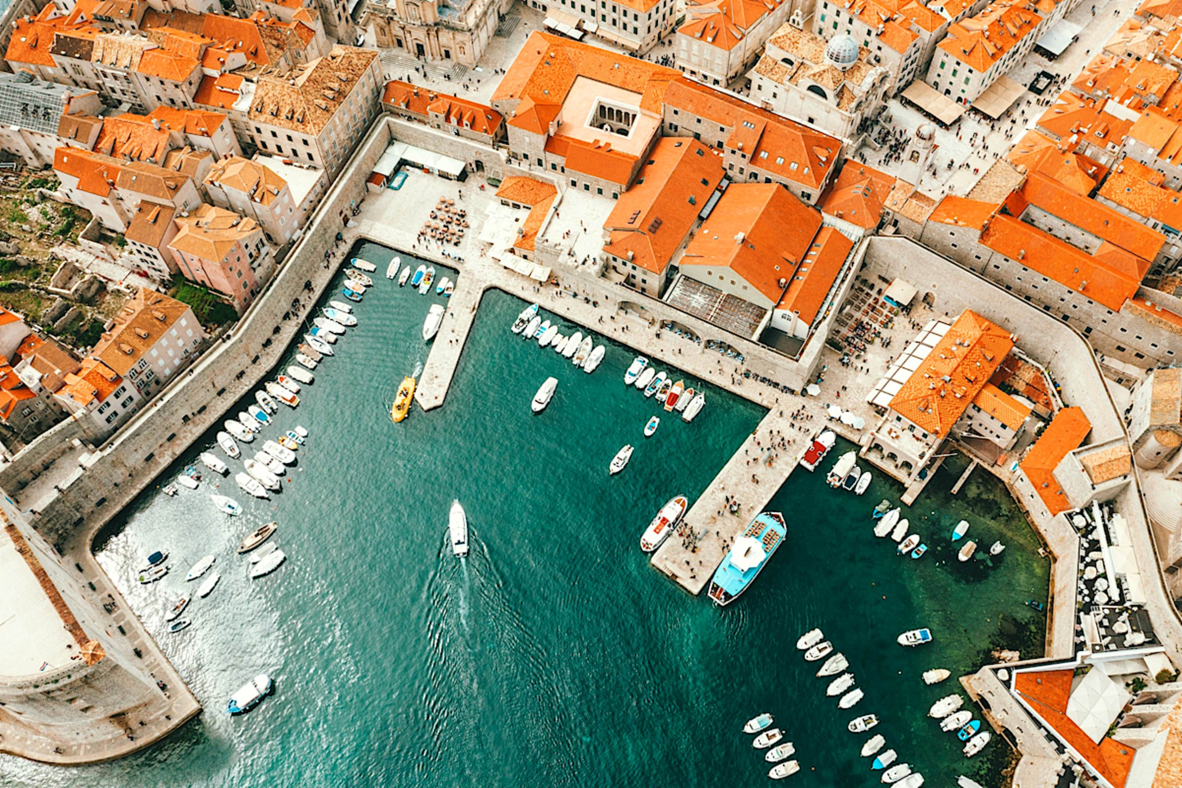 Medieval Walls, Culinary Elegance and Crystal Waters