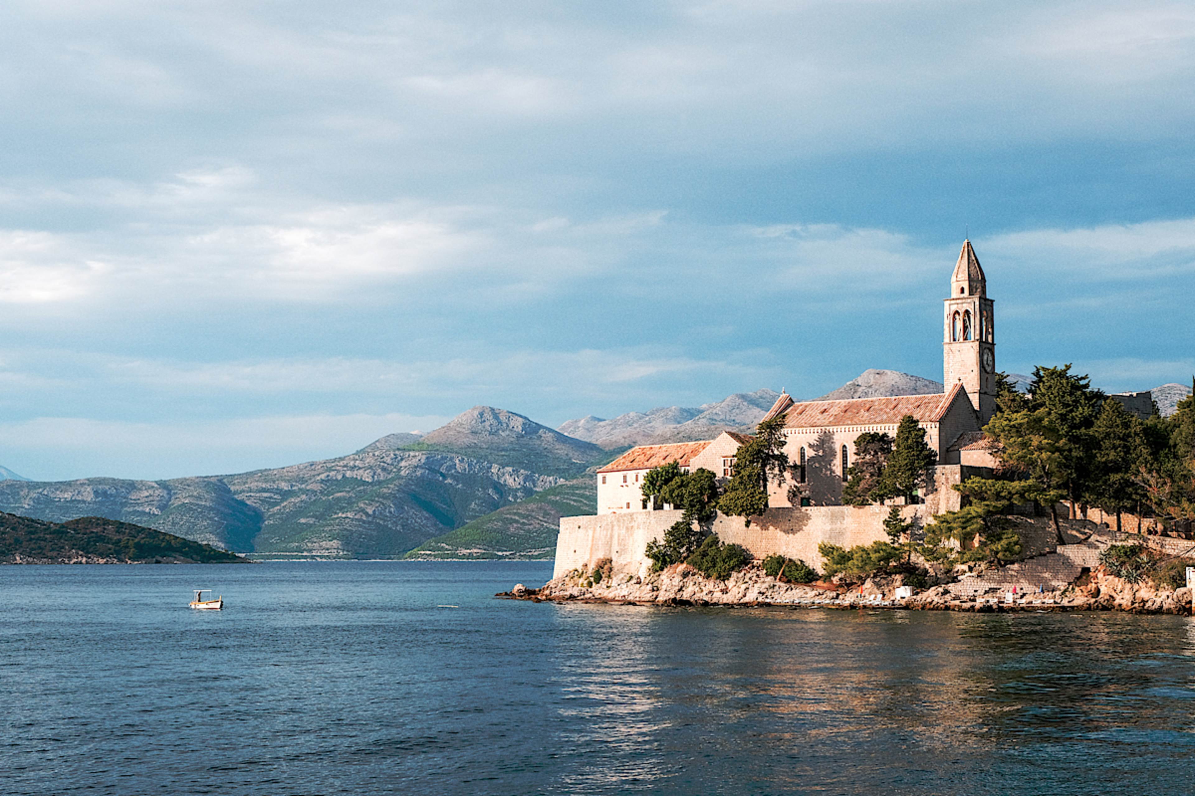 Medieval Walls, Culinary Elegance and Crystal Waters